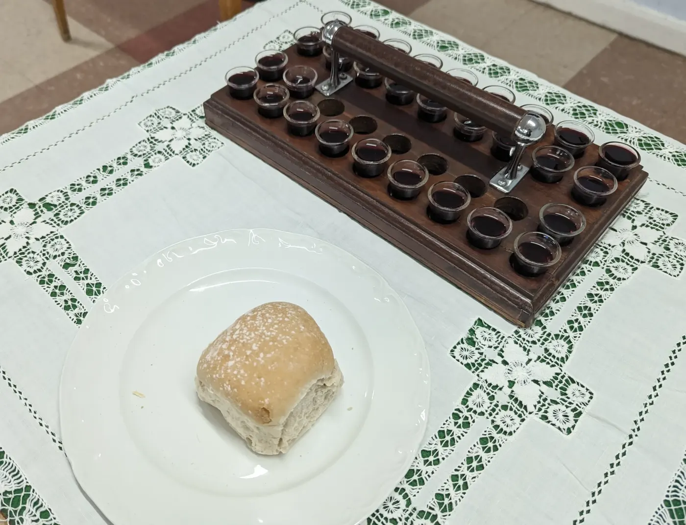 Bread and communion cups prepared for the Lord's Supper