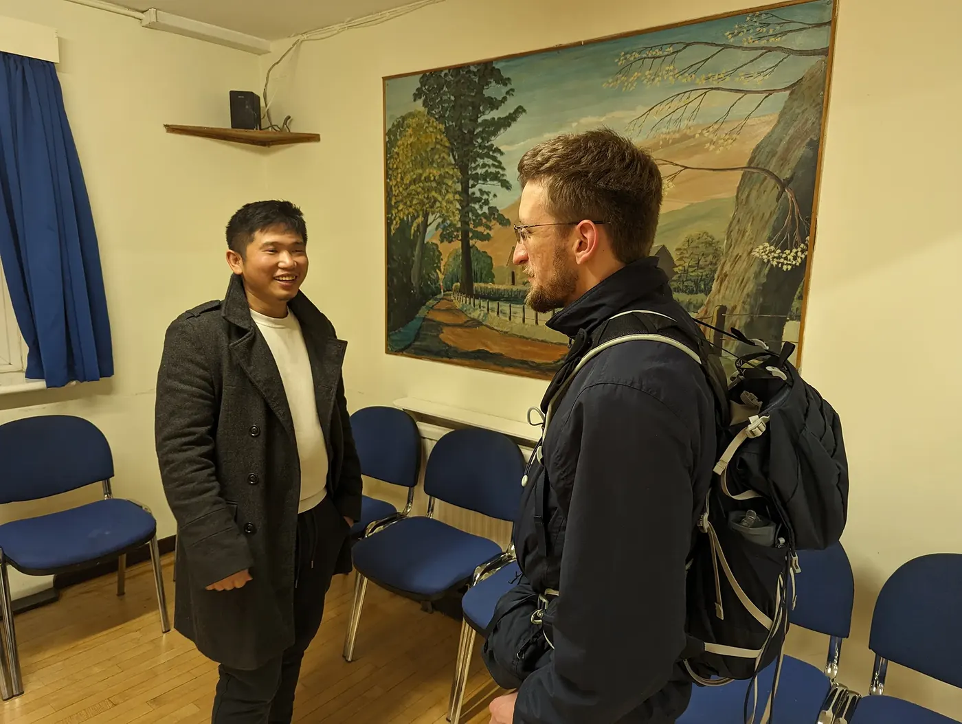 Two men talking together after the service